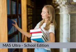 student holding books in library