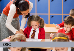 teacher helping students